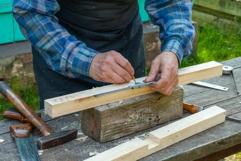 Close-up of senior carpenter hands Stock Photos