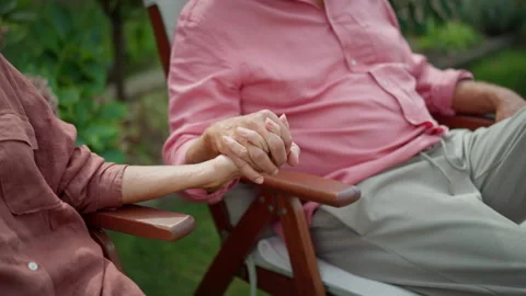 Close up of senior couple holding hands. Stock Footage 221349088