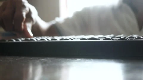 Close up of senior hand using chinese abacus or old antique calculator on table Stock Footage 138079170