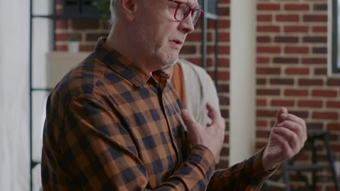 Close up of senior man complaining about addiction and mental health at aa Stock Footage 165147988