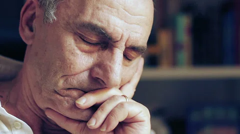 Close-up of a senior man thinking about something Stock Footage 32357723