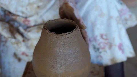 Close-up of senior woman's hands making traditional Mediterranean pottery Stock Footage 93133392