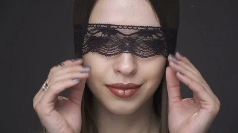 Close up sensual woman's face in a black lace headband Stock Footage 73116692