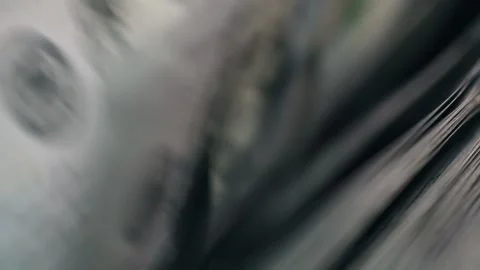 Close-up sequence of cash banknotes being handled, showcasing the texture and Vidéo 333979053