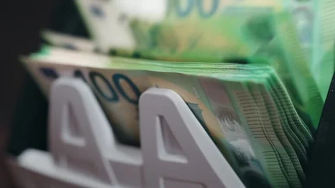 Close-up sequence of cash in a wallet showing multiple banknotes with visible 動画素材 331080383