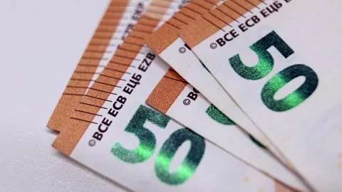 Close-up sequence of fifty euro banknotes showcasing intricate details, 스톡 동영상 325434393