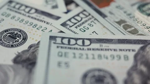 Close-up sequence of US dollar banknotes showcasing intricate details of design, Stock Footage 327695404