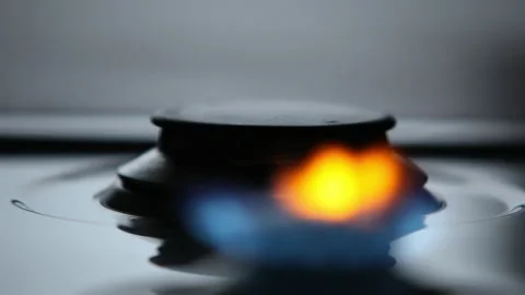 Close-Up of Sequential Gas Flame Ignition on Stove Stock Footage 220638879
