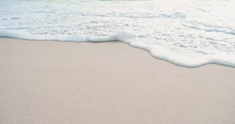 Close-up, Serene Waves and Crystal Waters: A Beautiful Beach Escape Stock Footage 305751616
