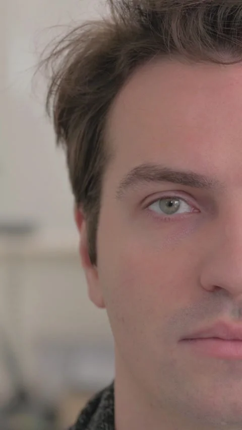 Close up of Serious Man Face, vertical video Stock Footage 324792977