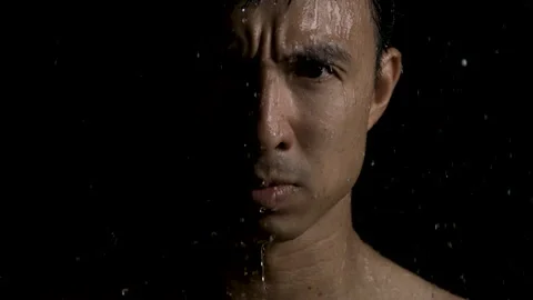Close up of Serious Man Standing Under Rain Stock Footage 270303495