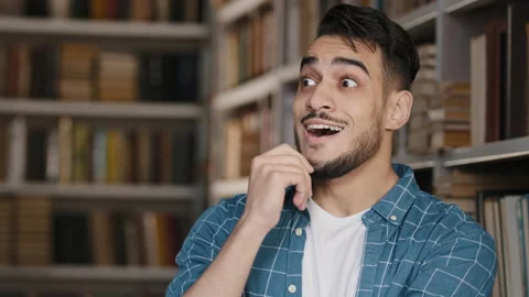 Close-up serious young pensive guy student thought about solving problem keeps Stock Footage 170655092