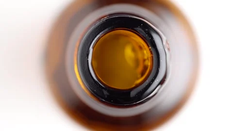 Close up of the serum bottle. Macro shot of serum gel falling in the bottle.  Stock Footage 255599423