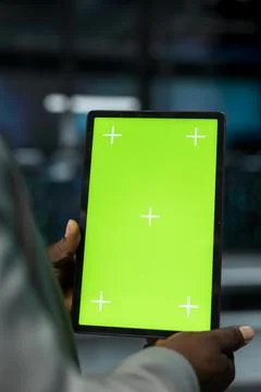 Close up of server farm developer using mockup tablet to repair equipment Stock Photos