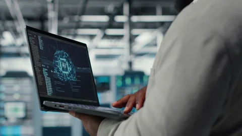 Close up of server hub admin using tablet to do infrastructure AI automatization Stock Footage 311831607