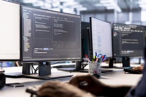 Close up of server hub IT professional debugging and optimizing code Stock Photos