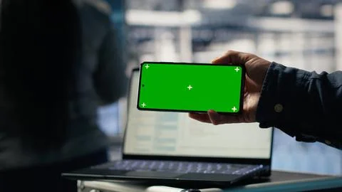 Close up of server hub programmer using mockup phone Stock Photos
