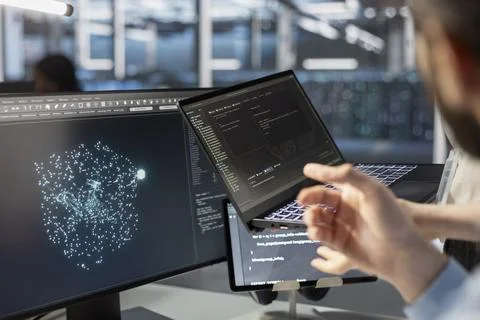 Close up of server hub software developer looking at data visualization Stock Photos