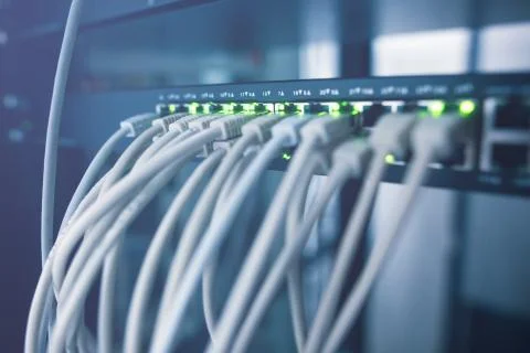 Close up of server rack cluster in a data center with kind of cables, IT concept Stock Photos