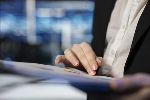 Close up of server room worker reading report files after rigs inspection Stock Photos