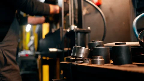Close up in a service station the hands of an auto mechanic work with disk from Stock Footage 276120530