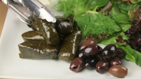 Close Up Serving Dolmades With Salad Stock Footage 38462851