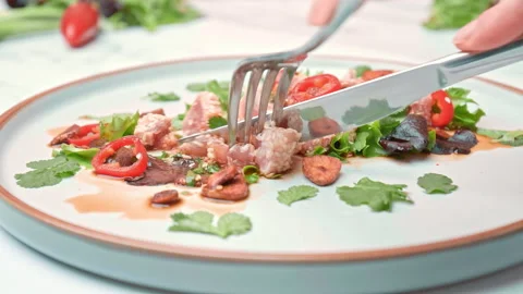 Close-up of serving with a fork and knife Sesame Crusted Tuna, Seared Tuna in 4K Stock Footage 141315424