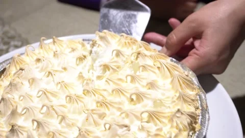 Close-up serving a lemon pie with knife Video stock 157820980