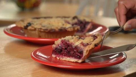 Close up of serving a slice of fruit pie Видео 96258340