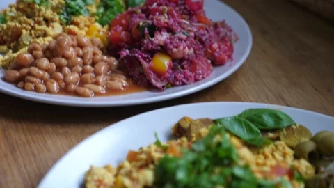 Close up of serving of two plates with vegan english breakfast. Healthy Stock Footage 139840941
