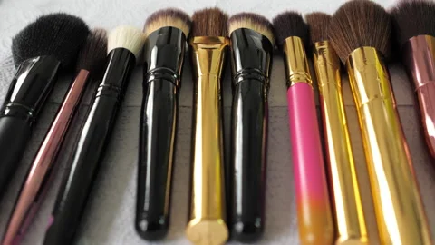 Close up set brushes lies on the table of a makeup artist in a beauty salon Stock Footage 132449335
