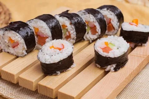 Close up a set of fresh and cheap Korean gimbap or kimbab rolls Stock Photos