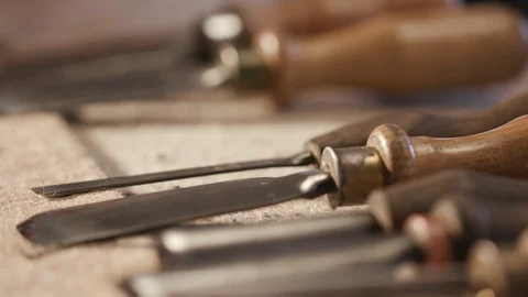 Close Up of a set of hand tools for Carving. Wood Carver working. Furniture Stock Footage 112627610