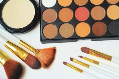 Close up.set of makeup brushes and eyeshadow on white background Stock Photos