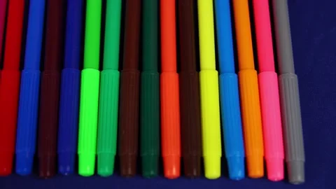 Close-up set of multicolored felt tip pen for kids on blue background. Stock Footage 167514016