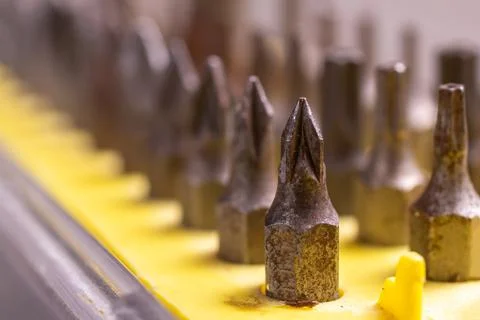 Close-up of a set of old rusty bits for a screwdriver Stock Photos