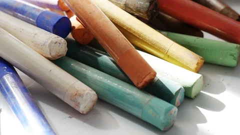 Close-up of a set of pastel crayons paint. Colorful chalks. Accessories for p Vídeo Stock 106565650