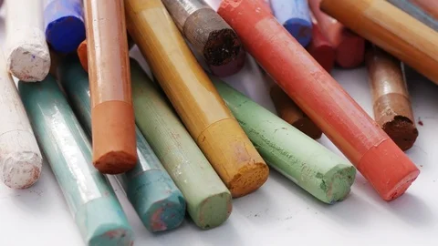 Close-up of a set of pastel crayons paint. Colorful chalks. Accessories for p Stock-Footage 106565777