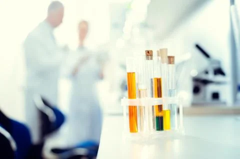 Close up of set test tubes containing chemical liquids Stock Photos