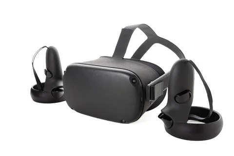 Close-up of a set of virtual reality devices. Joysticks and VR glasses isolat Stock Photos