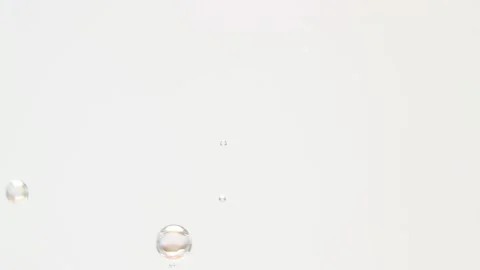 Close up several bubbles form and rise Stock Footage 131567438