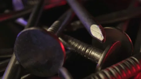 Close-up of several screw nails with a small thread in the form of notches Stock Footage 160565961