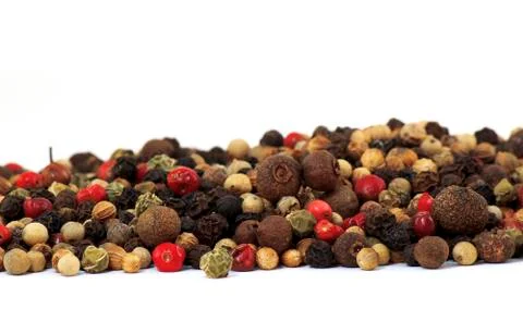 Close up of several types of peppercorns Stock Photos