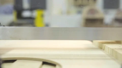A close-up of a sewing circle that cuts the board. Stock Footage 102858789