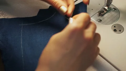 Close-up of sewing machine and fabric Stock Footage 152954578