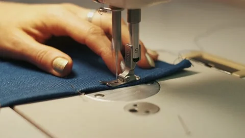 Close-up of sewing machine and fabric Video stock 152954587