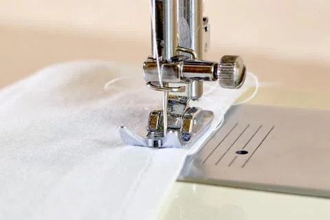 Close-up of a sewing machine and a sewing needle. Foot and needle of a sewing Stock Photos