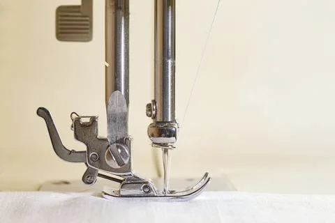 Close-up of a sewing machine and a sewing needle. Foot and needle of a sewing Stock Photos