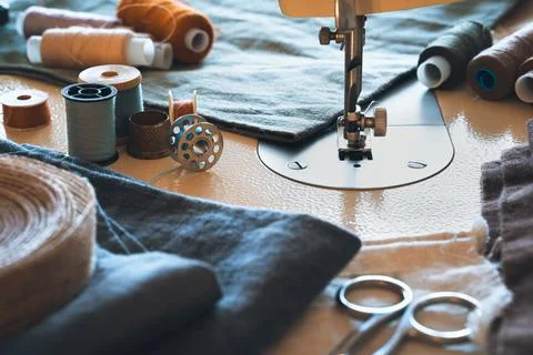 Close-up of a sewing machine on the background of accessories. Stock Photos