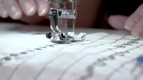 Close-up of a sewing machine needle-moving rapidly up and down. In a sewing Stock Footage 141747326